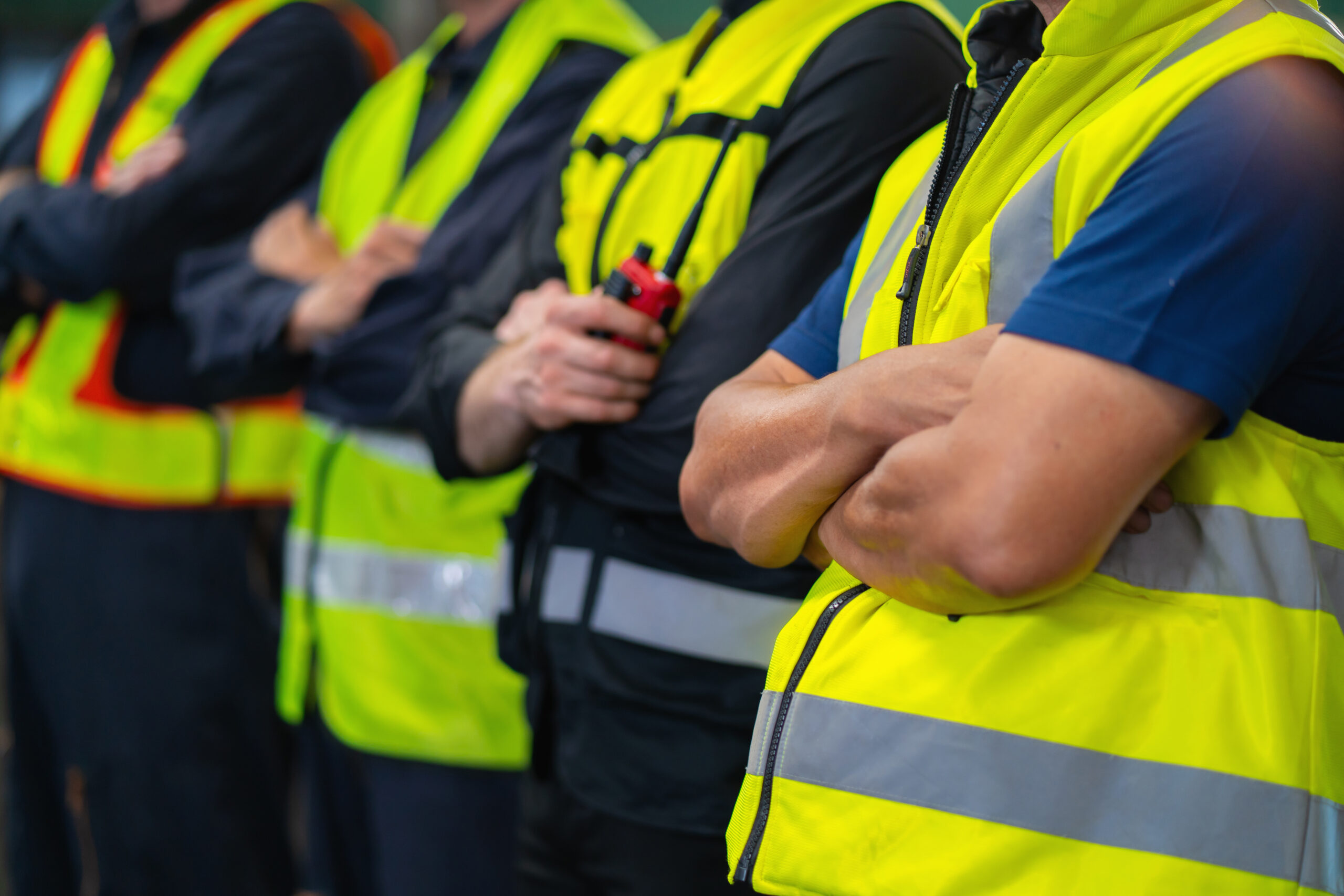 group of men in yellow safety vests stand together 2025 10 28 23 23 58 utc scaled
